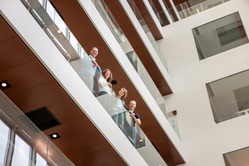 Team on balcony Pieter Fabienne Katja Marc